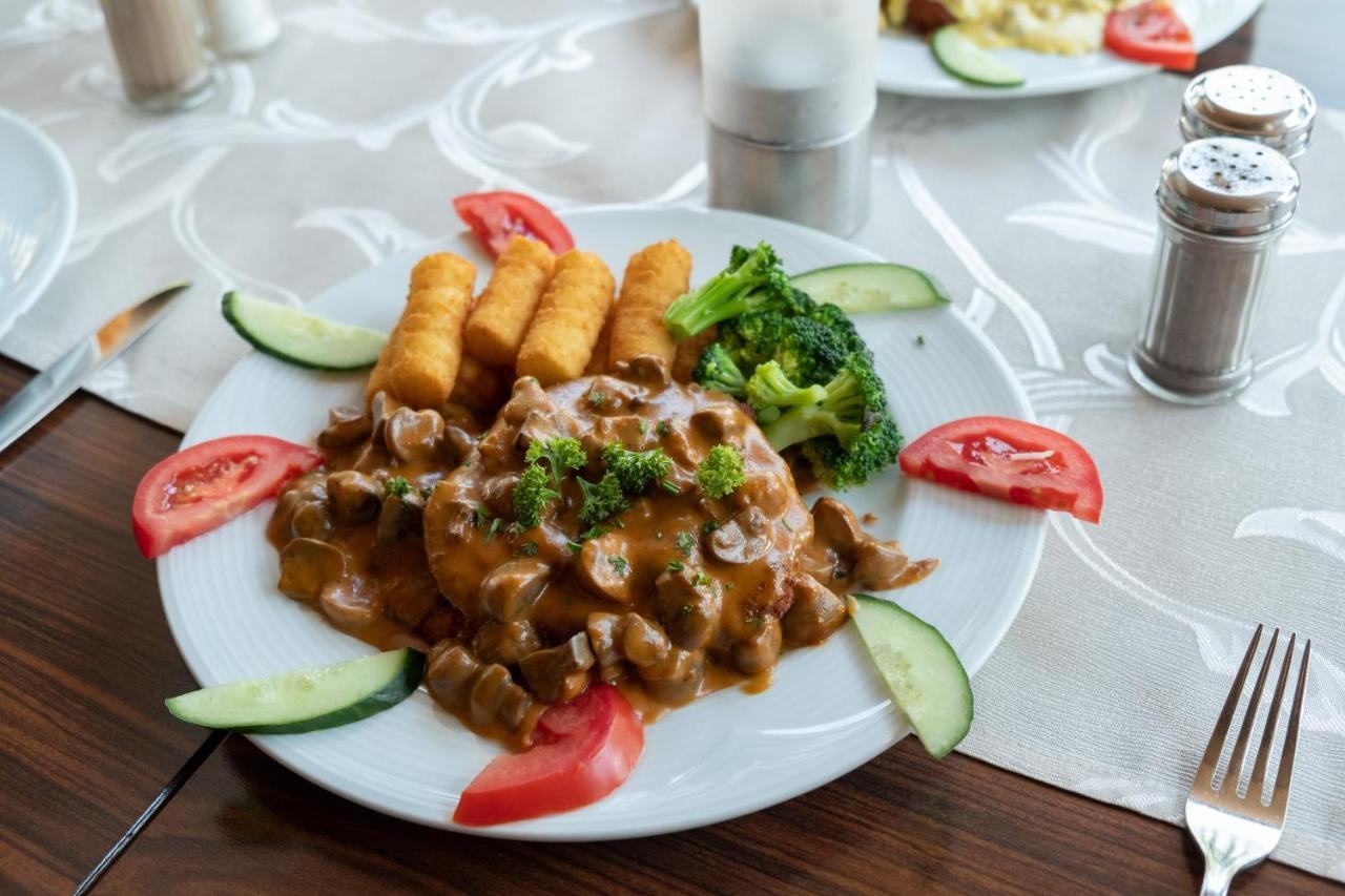 Schnitzelhaus Und Pension Stadt Rosbach Rosbach vor der Höhe Buitenkant foto